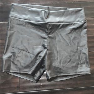 Black pleather shorts . Only worn and washed once!